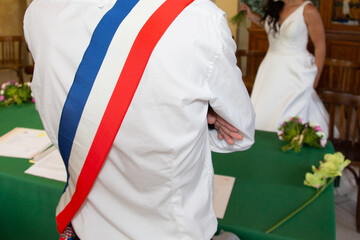 Wall Mural - French mayor with scarf france flag tricolor during weeding bride groom celebration