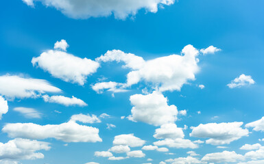 Wall Mural - Stunning view of a blue sky with some clouds during a sunny day. Natural background with copy space