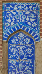 Beautiful decorative floral panel of blue and white ceramic tile on wall of ancient Khudabad mosque, Dadu, Sindh, Pakistan