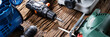 © Andrey Popov - Power Tools On Wooden Desk