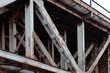 a fragment of a riveted structure with traces of rust on the steel span of the Prince Józef Poniatowski Bridge in Warsaw