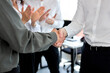 © alfa27 - close-up handshake business partners agree to sign contract. International trade,contract investment in meetings vision to invest for profit. side view on cropped business people having successful job