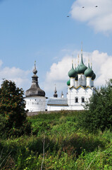 Wall Mural - View of the churches. Churches of the Rostov Kremlin. Green domes of churches with crosses.