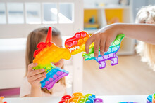 Little Girls,kids,sisters Play With Colorful Pop It Children Room,bedroom.Funny Trendy Silicone Antistress Colorful Sensory Push Toy Popit.Flapping Fidget.Rainbow Color.Cure Of Autism.Stress Reliever