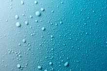 Water Drops On Smooth Surface, Blue Background