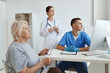 © SHOTPRIME STUDIO - nurse and doctor examining a patient Health hospital