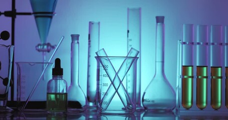 Wall Mural - hand scientist shaking tube with chemical liquid, scientific equipment and science technology concep