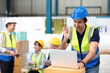 © offsuperphoto - engineer or factory worker using laptop computer and showing OK gesture sign language to someone
