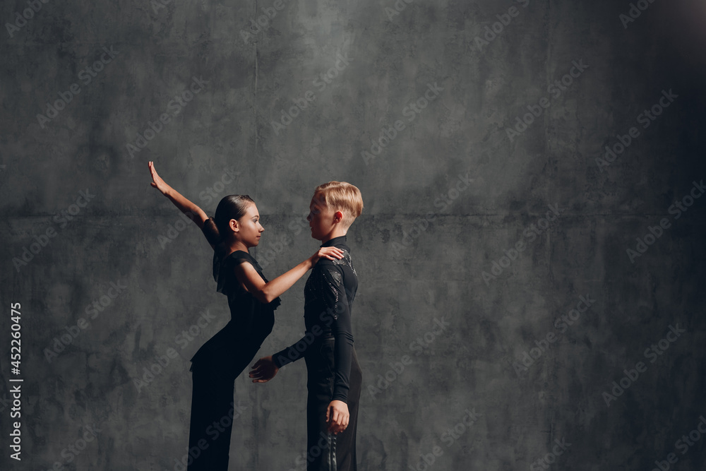 Couple in black dress dancing in ballroom dance rumba - obrazy, fototapety, plakaty 