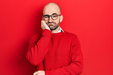 Sticker - Young bald man wearing casual clothes and glasses thinking looking tired and bored with depression problems with crossed arms.