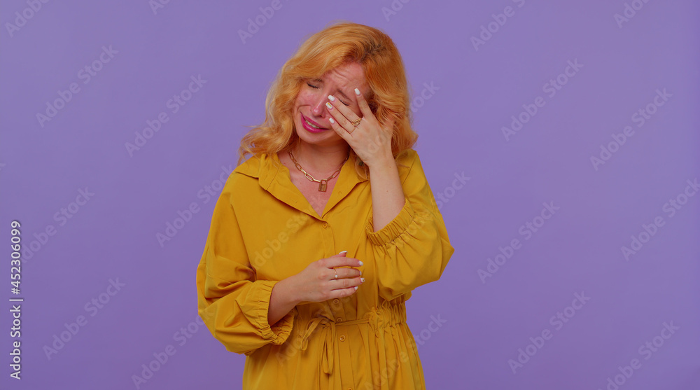 Pretty Disappointed Upset disappointed pretty stylish redhead girl in yellow dress wipes ...