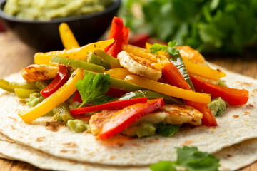 Poster - Tasty Halloumi cheese Fajitas with tortilla mix pepper and guacamole. Healthy food