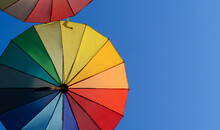 Street Decorated With Colorful Umbrellas In The Blue Sky