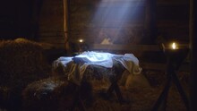 Manger With Blanket In Stable On Christmas Day