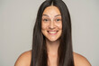 © vladimirfloyd - a young happy woman without makeup with long hair