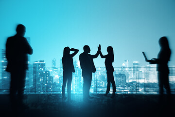 Canvas Print - Group of businesspeople with hi-five gesture standing on night city sky with mock up place background. Success, teamwork and communication concept.