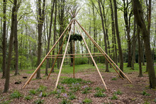 Wooden Structure With Wreath For A Woodland Naming Ceremony.