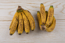 Bunch Of Yellow Freckled Bananas