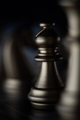 Poster - Closeup shot of chess pieces on dark background