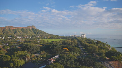 Aerial view of Diamond Head Crater with the Honolulu skyline. Amazing sunset on Oahu, Hawaii. United States. DCI 4k