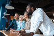© oneinchpunch - cinematic image of a multiethnic business team