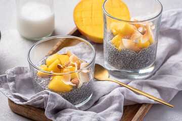 Wall Mural - Coconut milk Chia seed pudding with mango puree and fresh mango