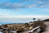 Fototapeta Las - rocky beach without people in the middle of nowhere in the mediterranean on a winter day in alicante spain  