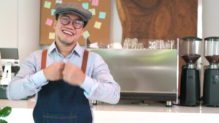 Wall Mural - Portrait of Asian man coffee shop manager standing in front of bar counter crossing arms and look at camera with happiness and proud. Small business restaurant entrepreneur and cafe owner concept.