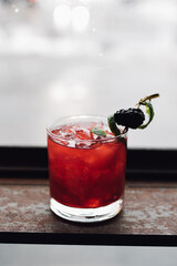 blackberry bourbon whiskey smash cocktail happy hour with lime 