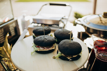 black hamburger on a plate