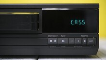 Pressing Your Finger On The Button On The Panel Of The VCR Ejects The Video Cassette. 
