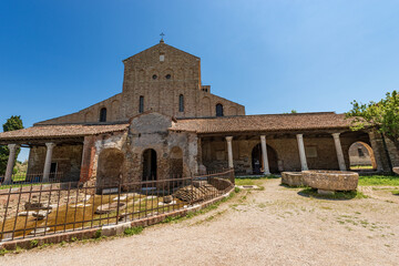 Wall Mural - Facade of the Basilica and Cathedral of Santa Maria Assunta in Venetian-Byzantine style (639) in Torcello island, one of the oldest churches in Venice, UNESCO world heritage site, Veneto, Italy. 