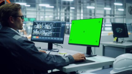 Poster - African American Engineer Using Laptop Computer and Looking Out of the Office at a Car Assembly Plant. Vehicle Factory Line Operator Working at Desk with Computer with Green Screen Display.
