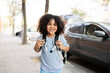 © PintoArt - Afro handsome boy, with backpack, gets out of the car to go to school, back to school, preschool