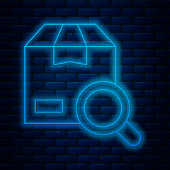 Poster - Glowing neon line Search package icon isolated on brick wall background. Parcel tracking symbol. Magnifying glass and cardboard box. Logistic and delivery. Vector