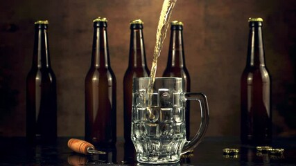 Poster - Super slow motion in the glass pours beer jet and spray. On a brown background.Filmed on a high-speed camera at 1000 fps.