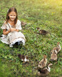 © Evgenia Tiplyashina - Girl with ducklings