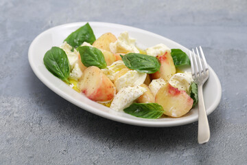 Wall Mural - peach caprese salad; flat peach, mozzarella and basil