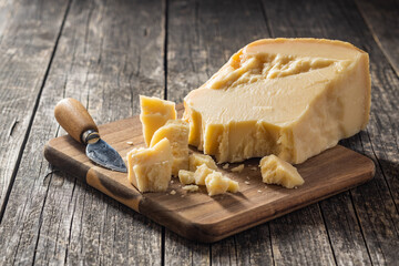 Pieces of italian parmesan cheese. Block of parmesan