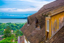 Reed Roofed House With Windows At The Lake Balaton