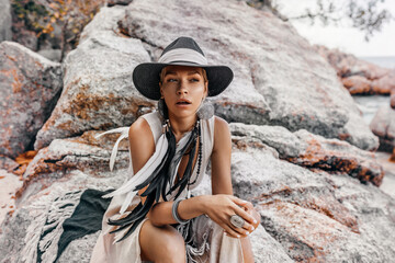 beautiful young stylish woman at sunset portrait