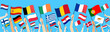 Close up of hands rising up 27 European Union member countries flags on blue background