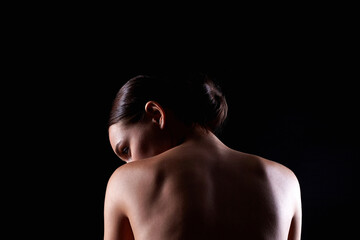 Female Back silhouette. Naked Woman.