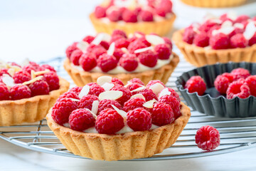 Wall Mural - Tartlets with custard and raspberries.