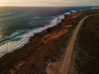 Wall Mural - Golden hour sunset over Quobba blowholes, Western Australia 