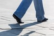 © BillionPhotos.com - Closeup of a Person Walking
