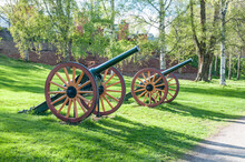Historical Cannons In A Park Area