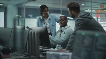 Poster - Diverse Multi-Ethnic Team in Modern Office: Teamwork of IT Programmers Gather Around Desktop Computer, Talking, Finding Solution. Specialists Create Software. Engineers Develop App, Program