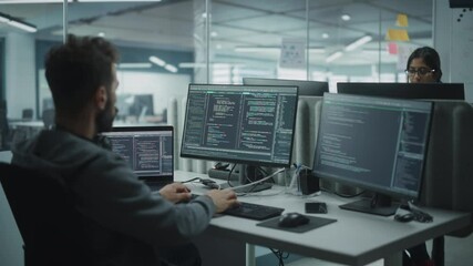 Poster - Diverse Office: IT Programmer Working on Desktop Computer. Male Specialist Creating Innovative Software Engineer Developing App, Program, Video Game. Terminal with Coding Language. Over Shoulder