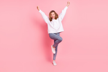 Poster - Full length body size view of attractive cheerful girl dancing having fun rejoicing isolated over pink pastel color background